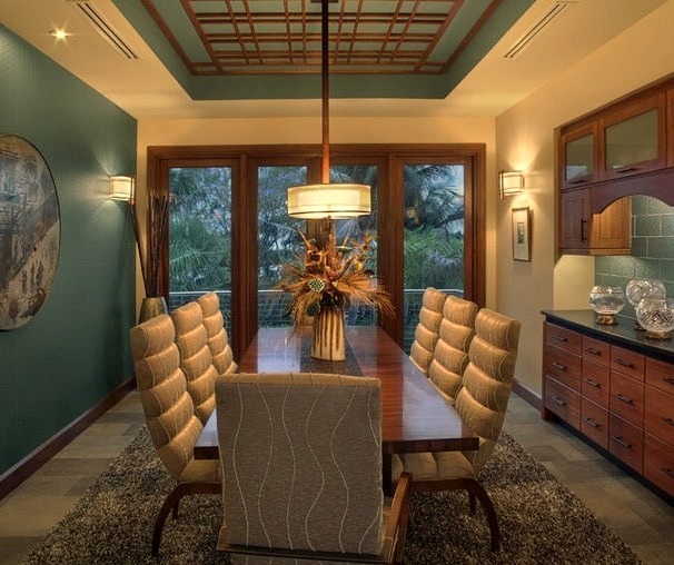 Mid-sized trendy porcelain tile enclosed dining room photo with blue walls